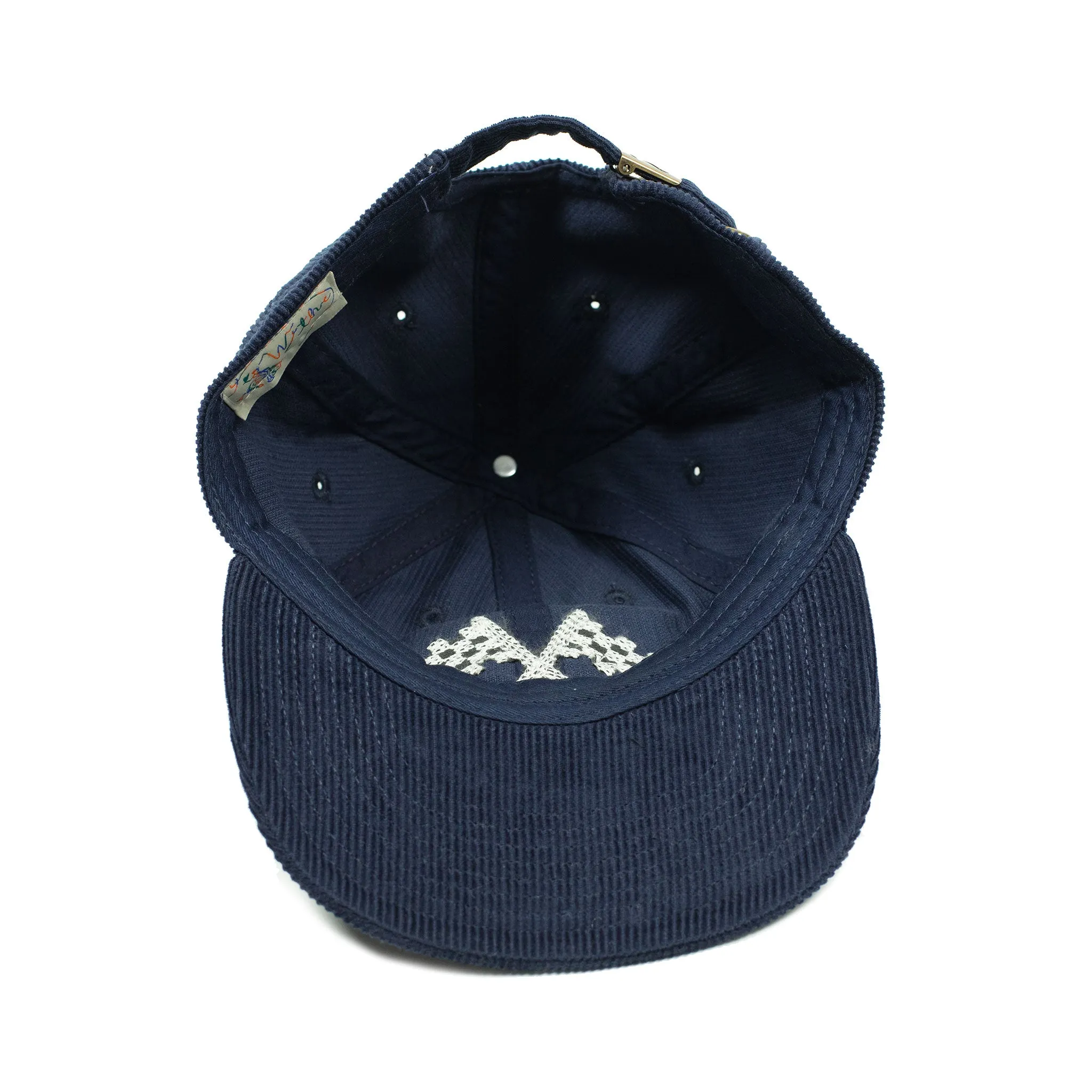 Corduroy cap in navy with racing flag chainstitched embroidery